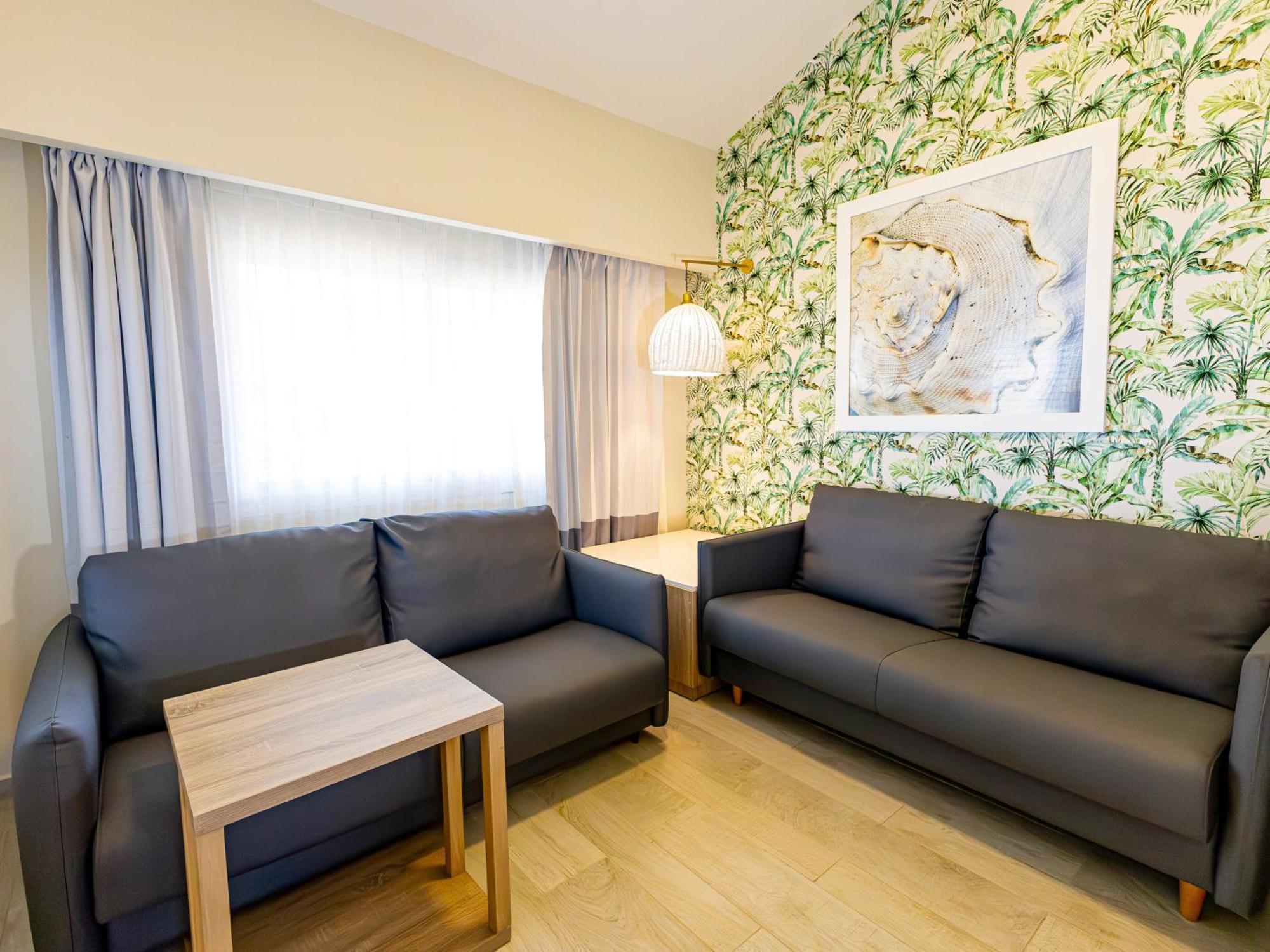 אוברו אלטו Grand Sirenis Punta Cana Resort & Aquagames מראה חיצוני תמונה A living room in a hotel