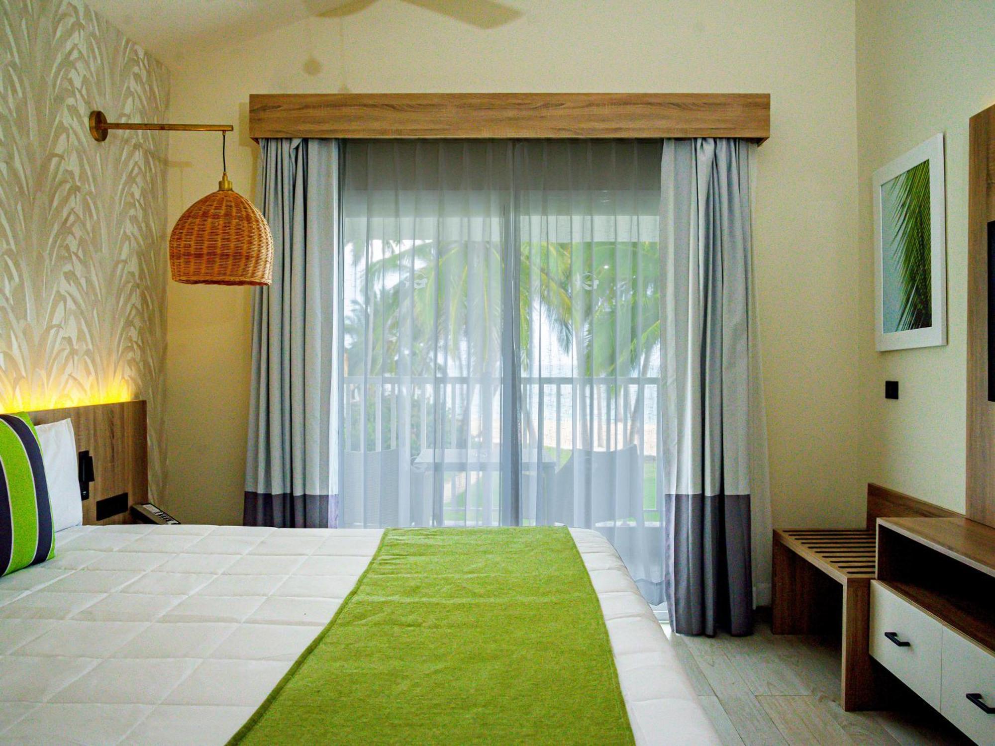 אוברו אלטו Grand Sirenis Punta Cana Resort & Aquagames מראה חיצוני תמונה A bedroom at the resort